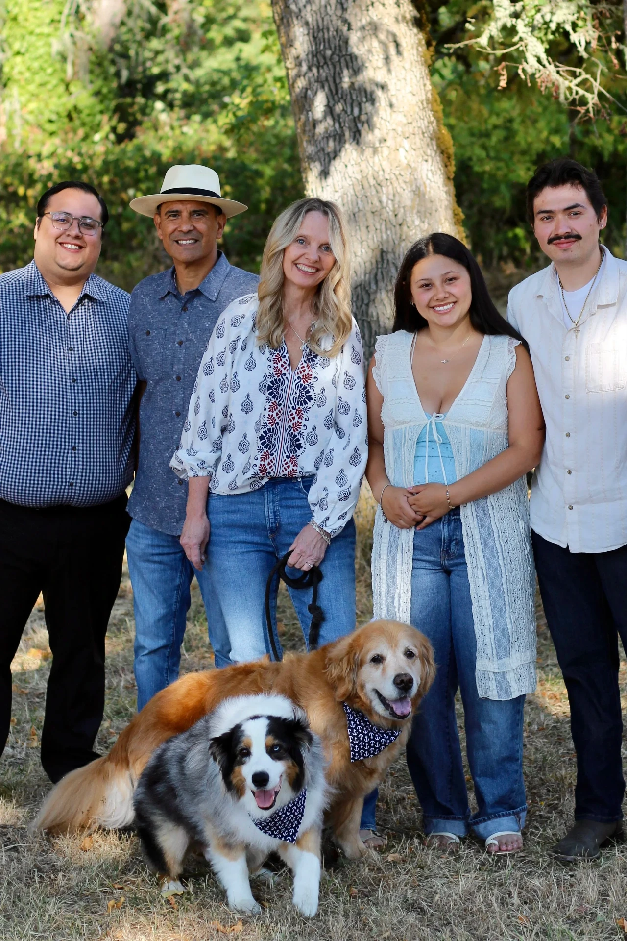 Jill Cuadros with her family and dogs